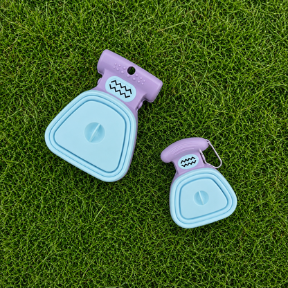 PawsSource Portable Dog Poop Scooper – Powder Blue Scoop with Lavender Handle, Small & Large Sizes Displayed on Grass